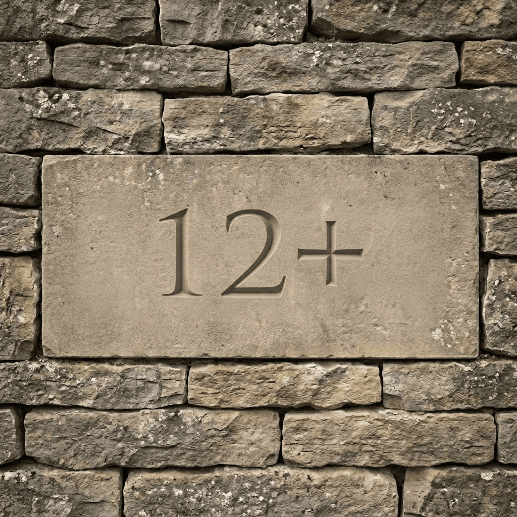 12+ — Industry Awards, carved into a drystone wall